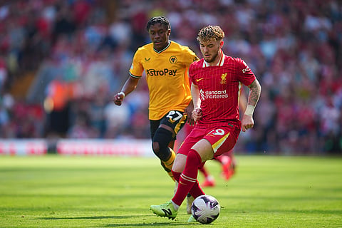 Harvey Elliott and Jeanricner Bellegarde fight for the ball